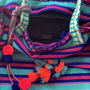 Boho bag with pom poms